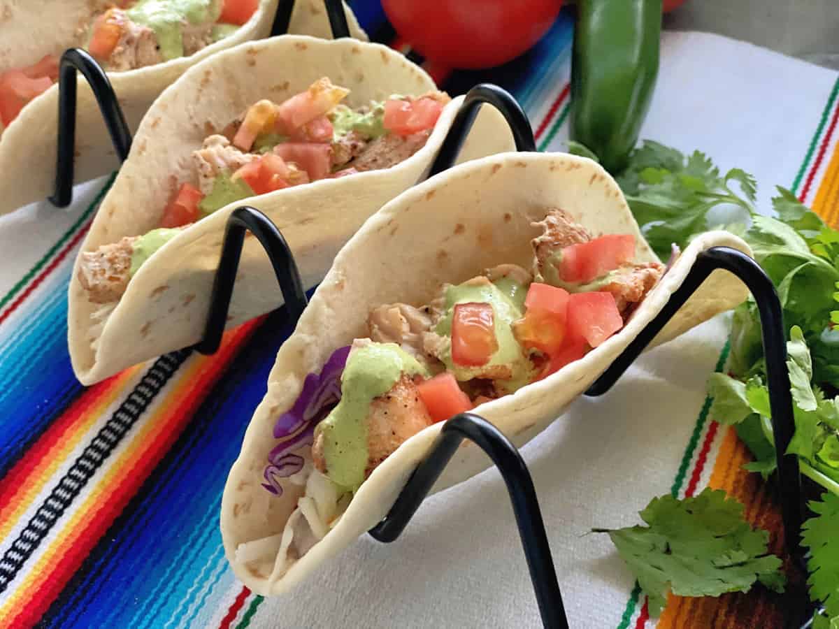 The Fishery signature dishes Swordfish TacosFish and ChipsMacadamia Crusted Halibut